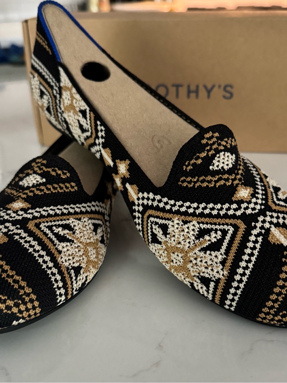 Rothy's Black, Gold & White Geometric Knit Loafers